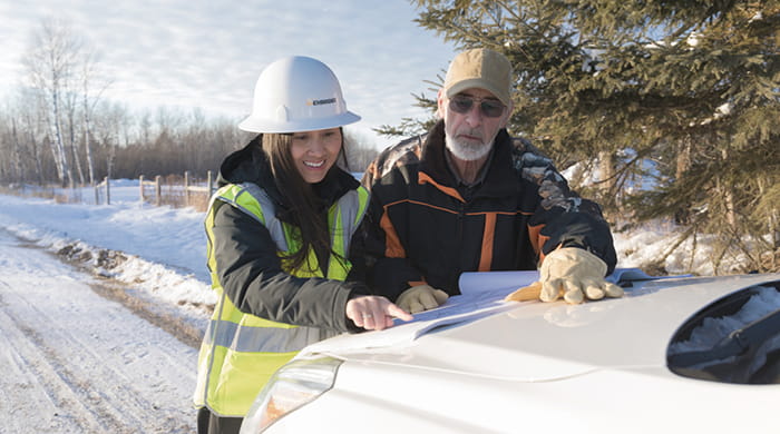 Enbridge Gas employee reviewing site plans