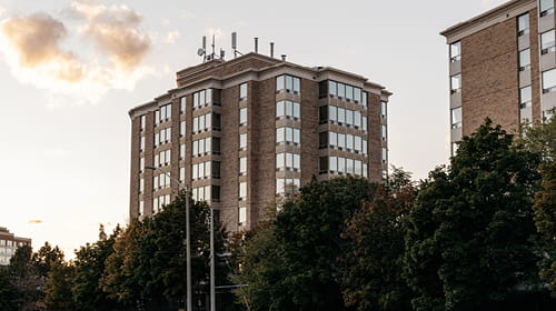 Large brown condominium building