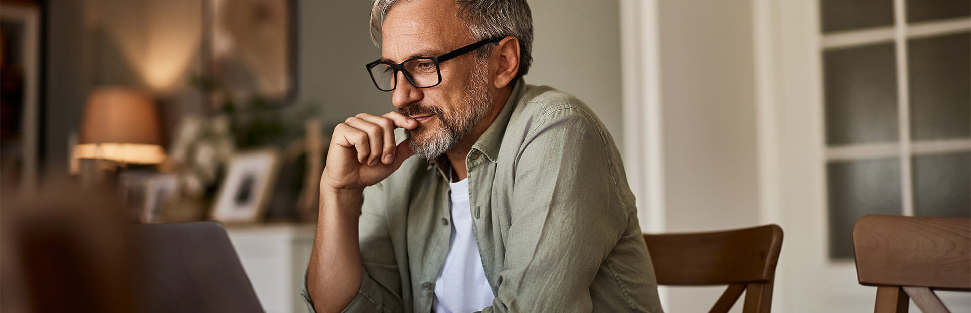 Man Looking at Computer Screen