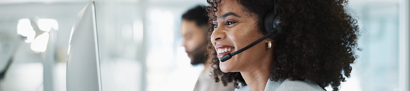 A happy person working in customer service