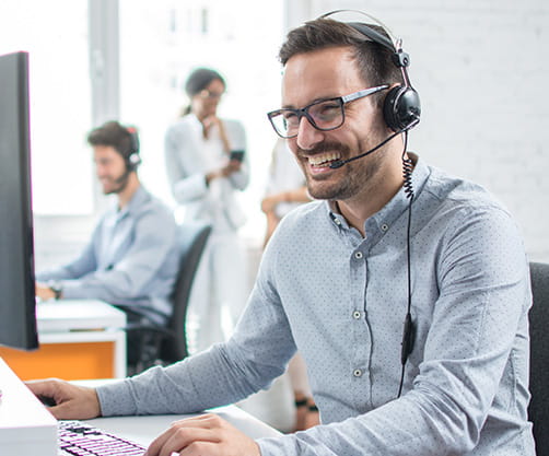 A happy person working in customer service
