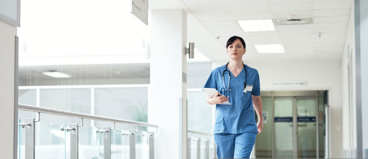 Nurse walking the halls of the hospital